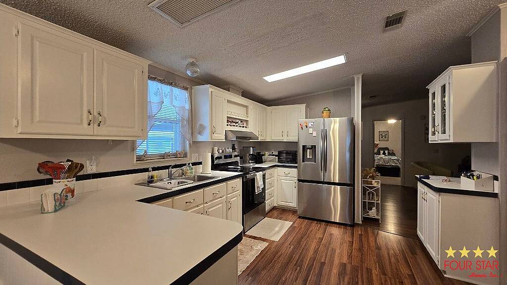 Photo of 7927 Walkers Cay Ave #2217, Orlando, FL 32822 (MLS # 11922501)