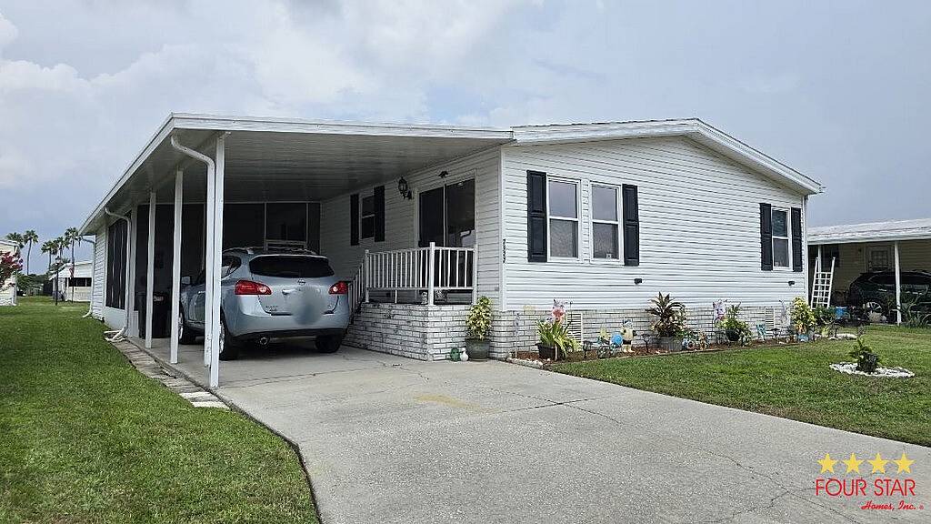 Photo of 7927 Walkers Cay Ave #2217, Orlando, FL 32822 (MLS # 11922501)