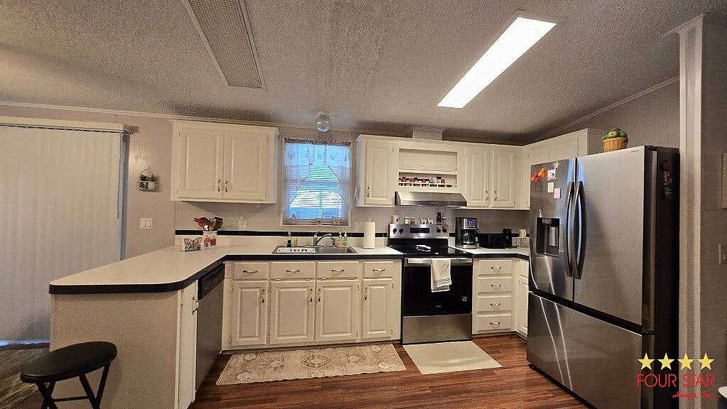Photo of 7927 Walkers Cay Ave #2217, Orlando, FL 32822 (MLS # 11922501)