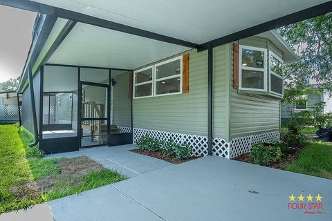 Photo of 237 Sunset Circle, Tampa, FL 33613 (MLS # 11729807)