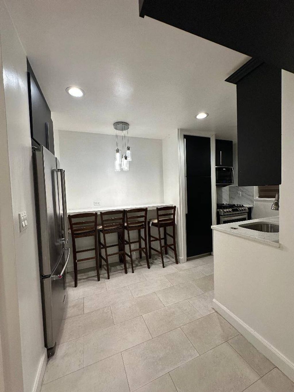 Photo of 14017 84th Dr #2C, Briarwood, NY 11435 (MLS # 11678050)