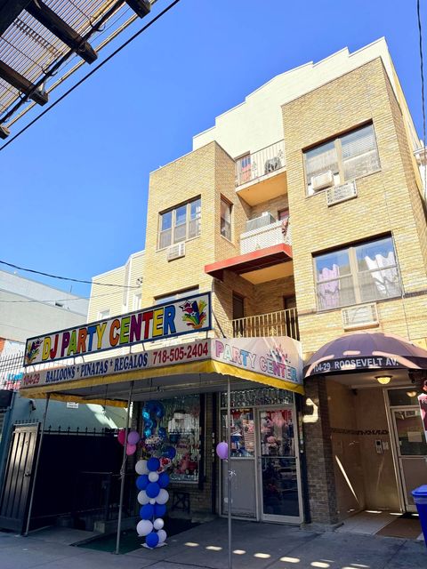 Photo of 10429 Roosevelt Ave, Corona, NY 11368 (MLS # 11680418)