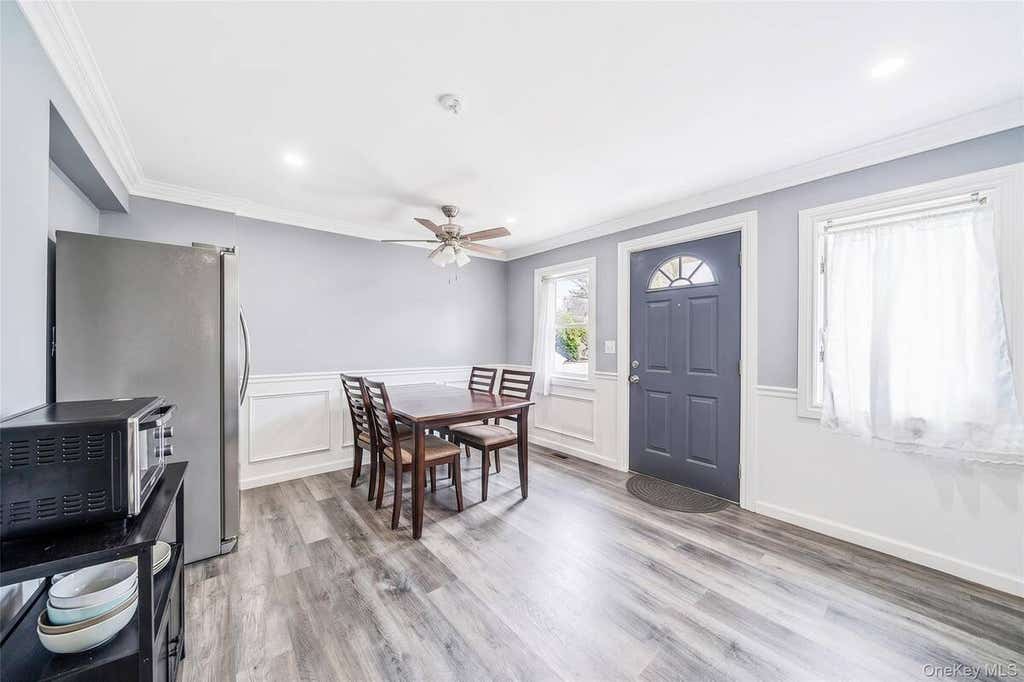 Photo of 5 Sinclair Street, Mastic, NY 11950 (MLS # 11937117)