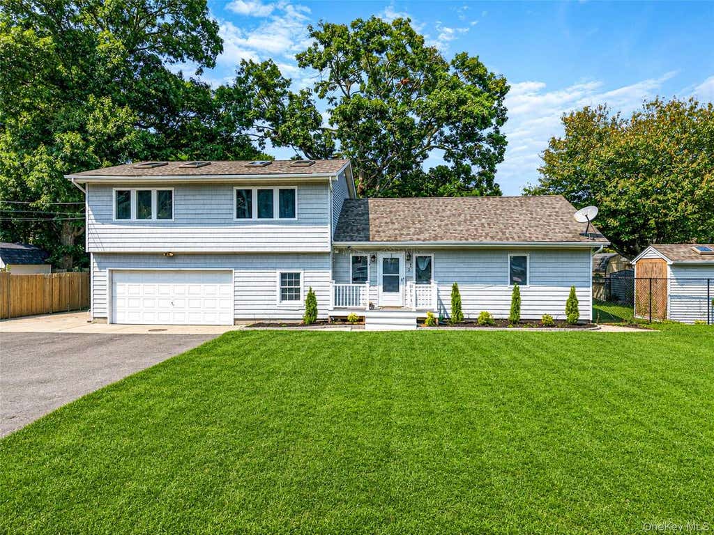 Photo of 5 Sinclair Street, Mastic, NY 11950 (MLS # 11937117)