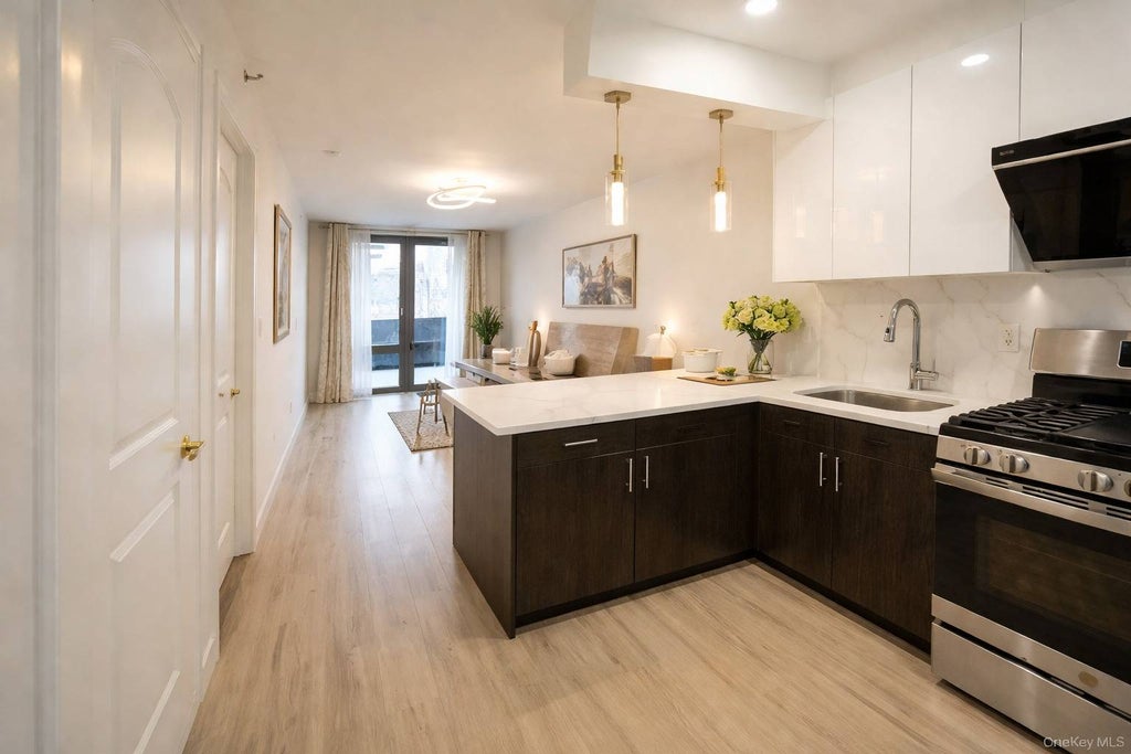 Photo of 7065 Queens Boulevard #8J, Woodside, NY 11377 (MLS # 11775160)