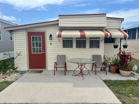 Photo of 91 Kumquat Road, Palmetto, FL 34221 (MLS # 11687100)