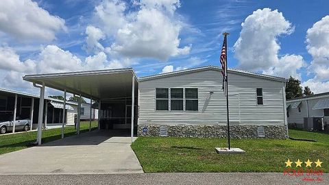 Photo of 7823 Walkers Cay Ave, Orlando, FL 32822 (MLS # 11779327)