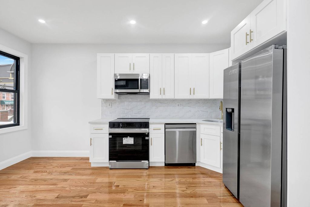 Photo of 1559 remsen Ave, brooklyn, NY 11236 (MLS # 11738213)