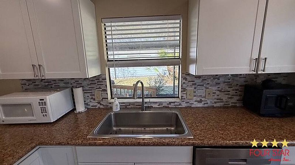 Photo of 28 Falls Way Dr, Ormond Beach, FL 32174 (MLS # 11641535)