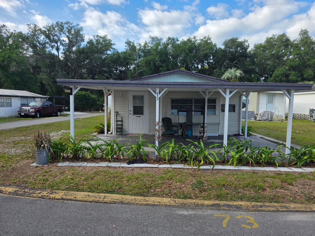 Photo of 34648 Leisure Days Dr, Zephyrhills, FL 33541 (MLS # 11739978)