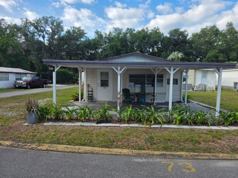 Photo of 34648 Leisure Days Dr, Zephyrhills, FL 33541 (MLS # 11739978)