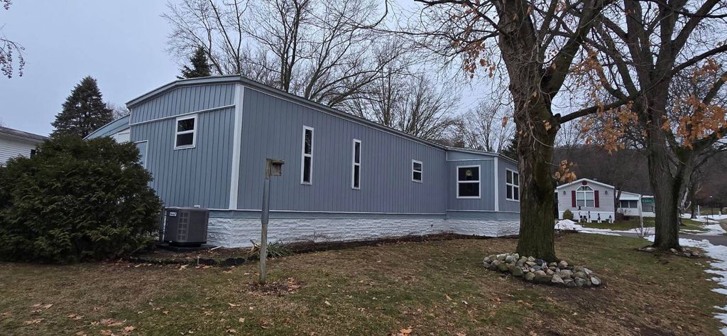 Photo of 5635 N Seagull Dr NE, Belmont, MI 49306 (MLS # 11642401)