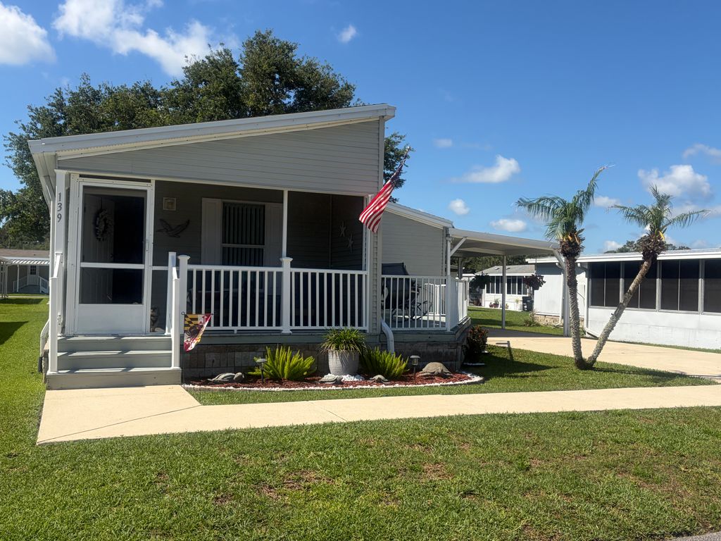 Photo of 139 New York Dr, New Smyrna Beach, FL 32168 (MLS # 11775966)
