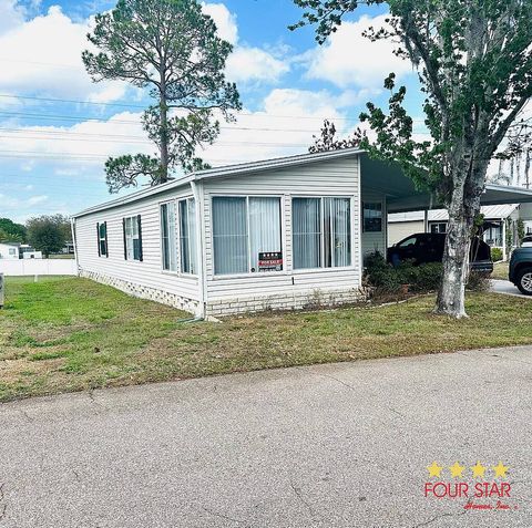 Photo of 350 Kingslake Dr, DeBary, FL 32713 (MLS # 11715425)