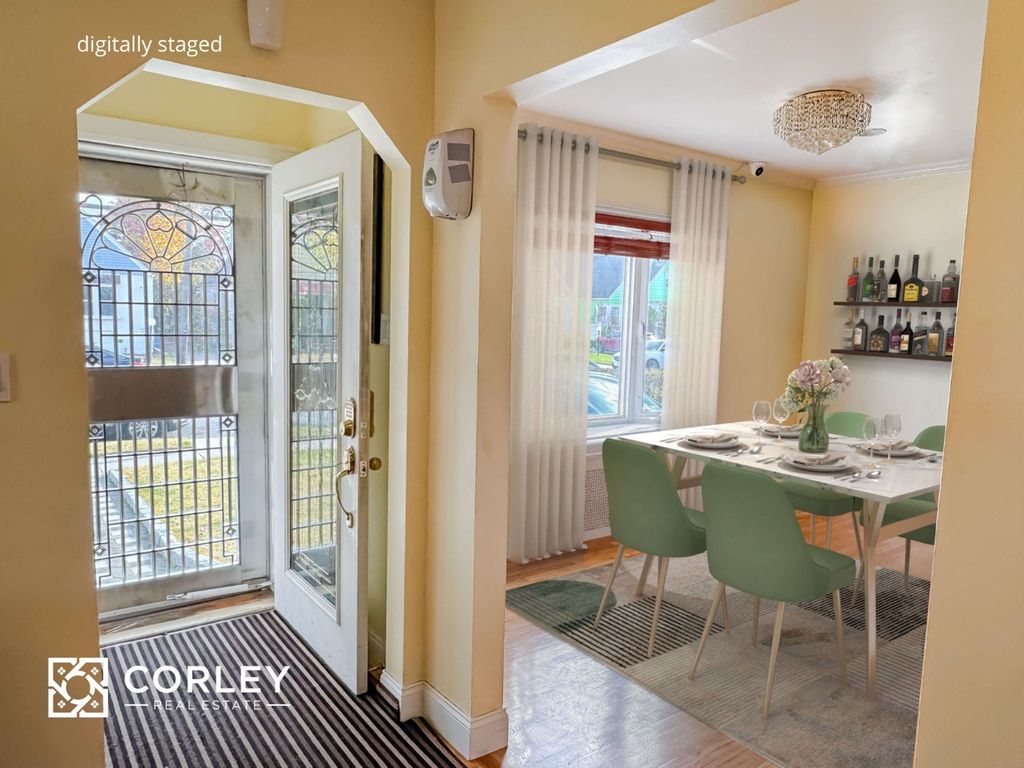 Photo of 12042 231st St, New York, NY 11411 (MLS # 11612922)