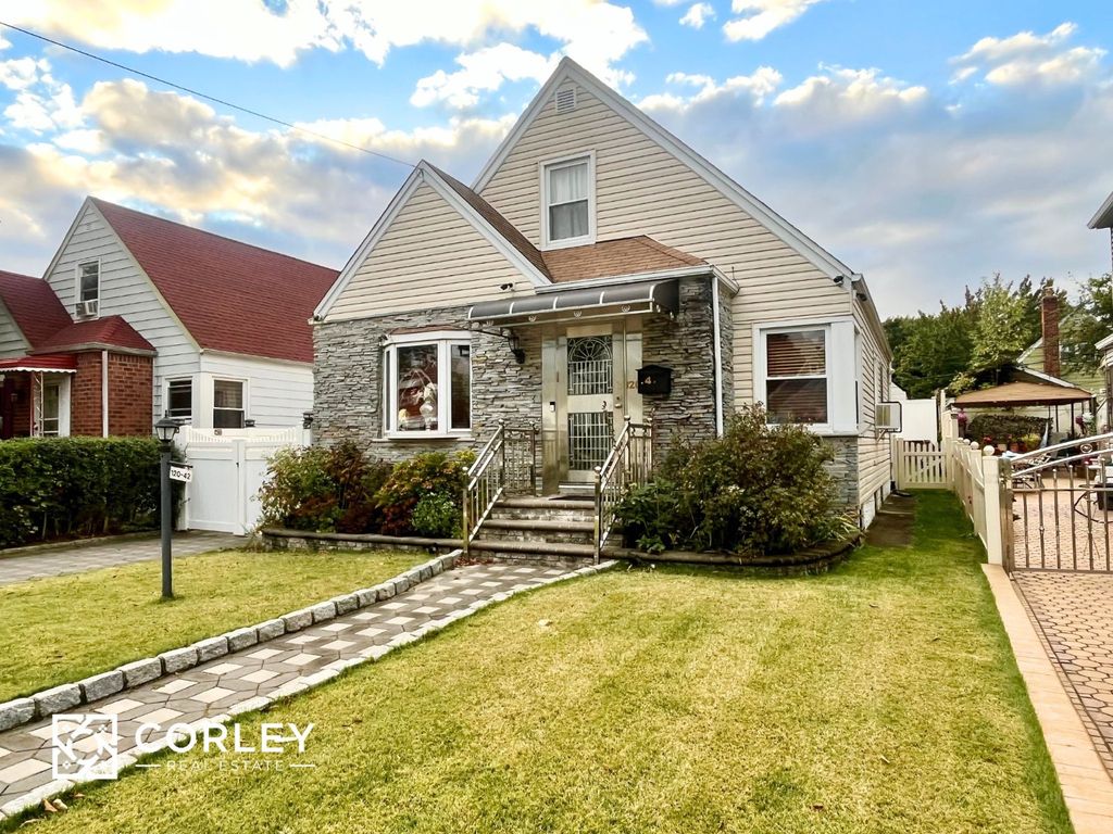 Photo of 12042 231st St, New York, NY 11411 (MLS # 11612922)