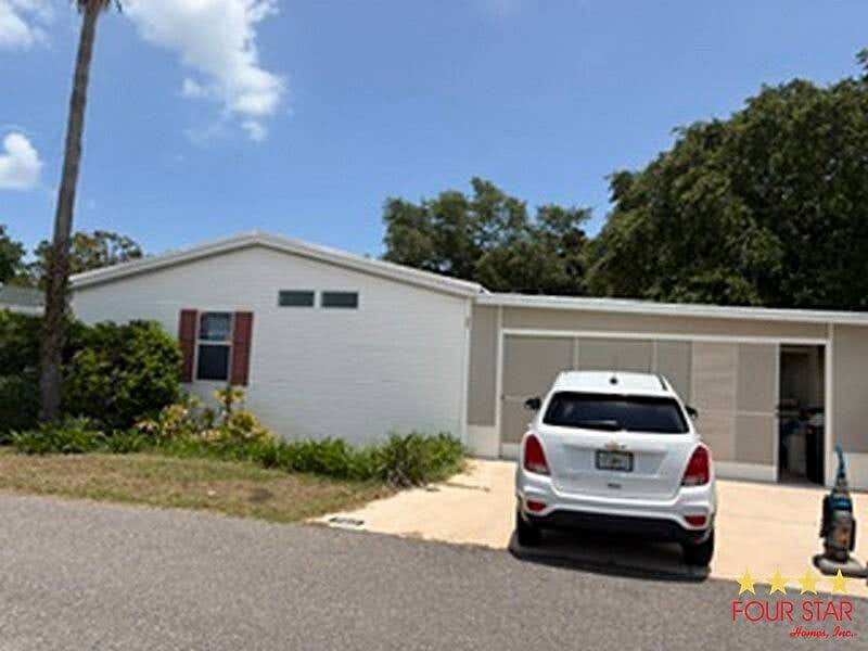 Photo of 360 Hacienda, Edgewater, FL 32141 (MLS # 11863198)