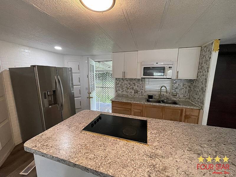 Photo of 58 Pickering Dr, Kissimmee, FL 34746 (MLS # 11929405)