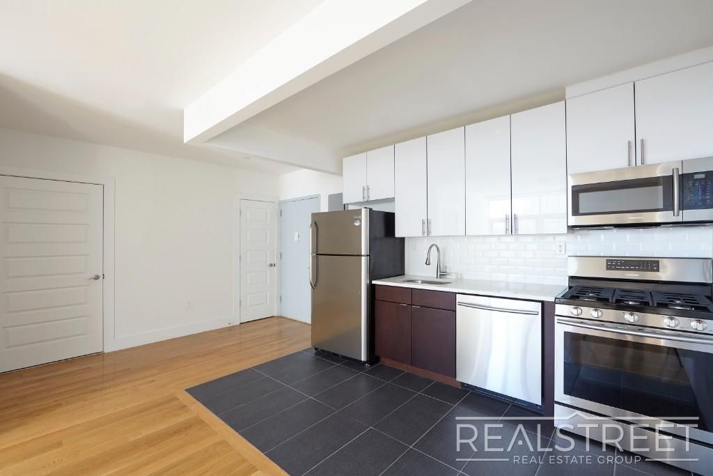 Photo of 9002 Queens Blvd #433, ELMHURST, NY 11373 (MLS # 11641860)