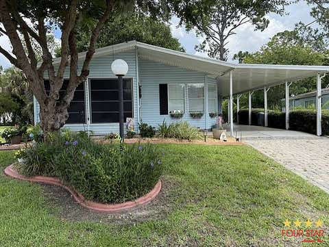 Photo of 84 Tropical Falls Dr, Ormond Beach, FL 32174 (MLS # 11874560)