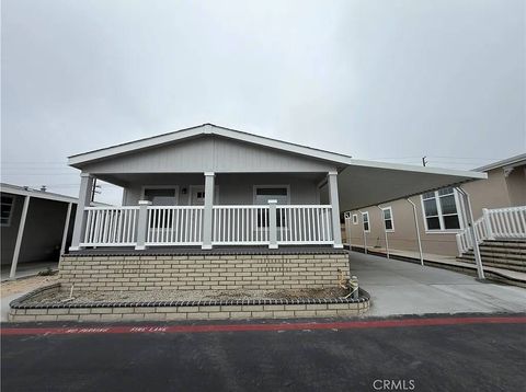 Photo of 9850 Garfield Ave #18, Huntington Beach, CA 92646 (MLS # 11738260)