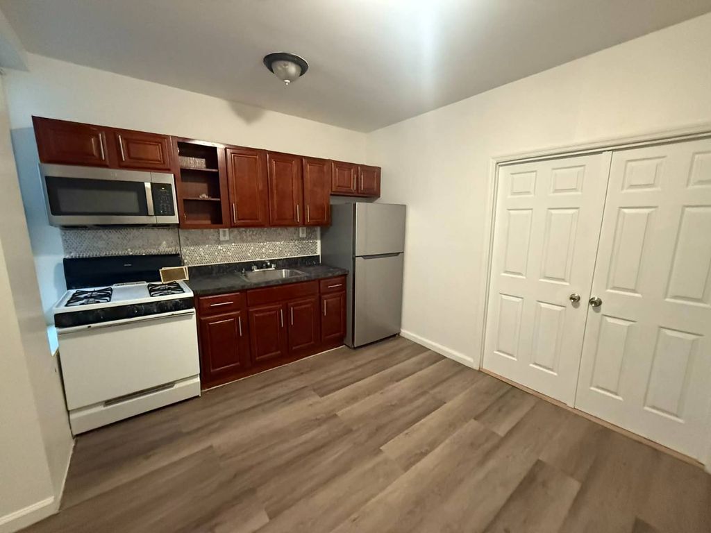 Photo of 92 Fountain Ave, Brooklyn, NY 11208 (MLS # 11660900)