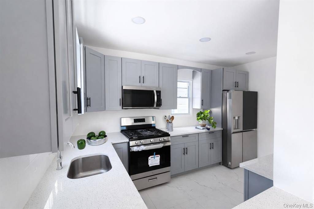 Photo of 11216 198th St, St Albans, NY 11412 (MLS # 11641770)