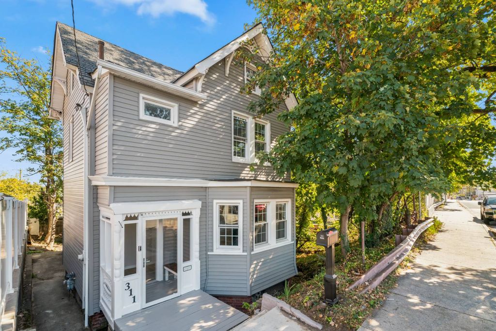 Photo of 311 Tompkins Avenue, Staten Island, NY 10304 (MLS # 11594496)