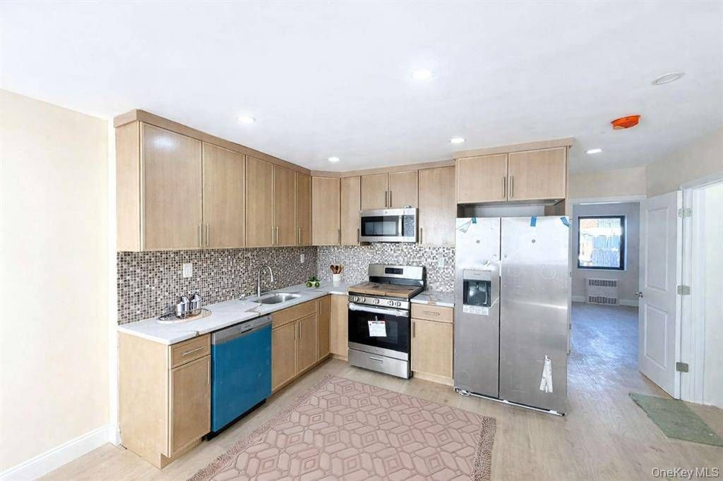 Photo of 7305 Cook Ave, Middle Village, NY 11379 (MLS # 11641774)