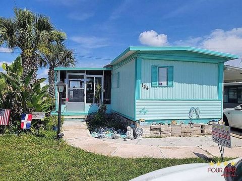 Photo of 918 Reed Canal Road #144, South Daytona, FL 32119 (MLS # 11792035)