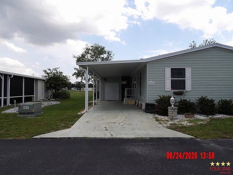 Photo of 5052 El Adobe Dr, Leesburg, FL 34748 (MLS # 11855559)