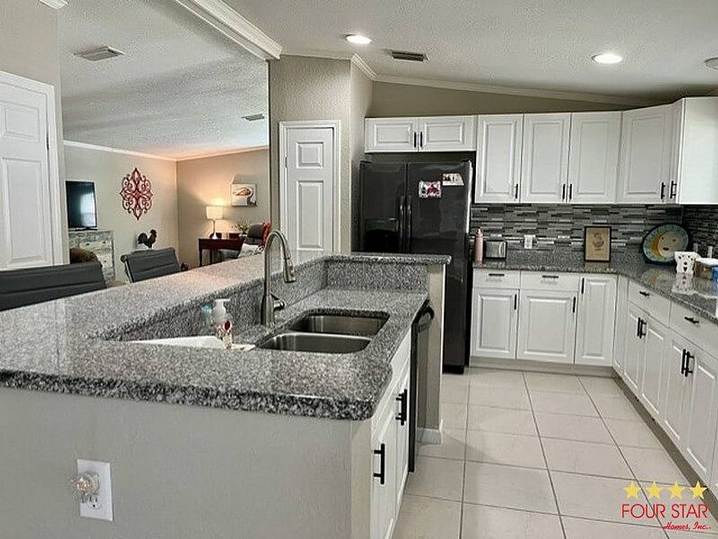 Photo of 33 Polar Bear Path #154, Ormond Beach, FL 32174 (MLS # 11742055)