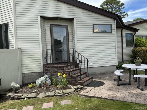 Photo of 31 Cottage Drive, Farmingville, NY 11738 (MLS # 11845693)