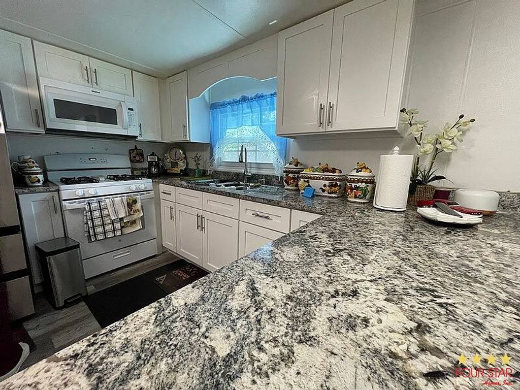 Photo of 7153 Linmar Cir, Orlando, FL 32818 (MLS # 11741234)