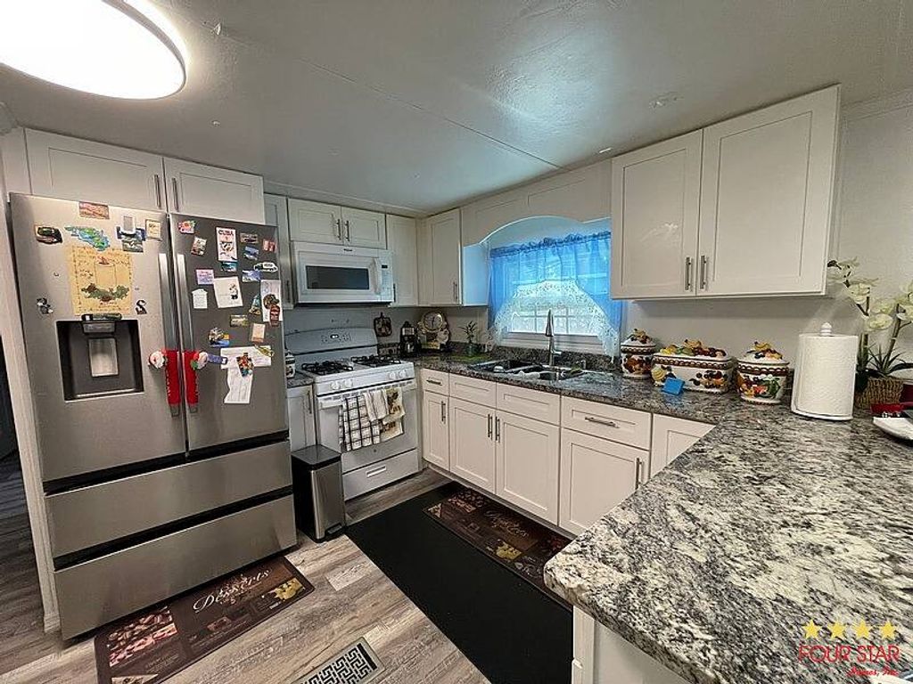 Photo of 7153 Linmar Cir, Orlando, FL 32818 (MLS # 11741234)
