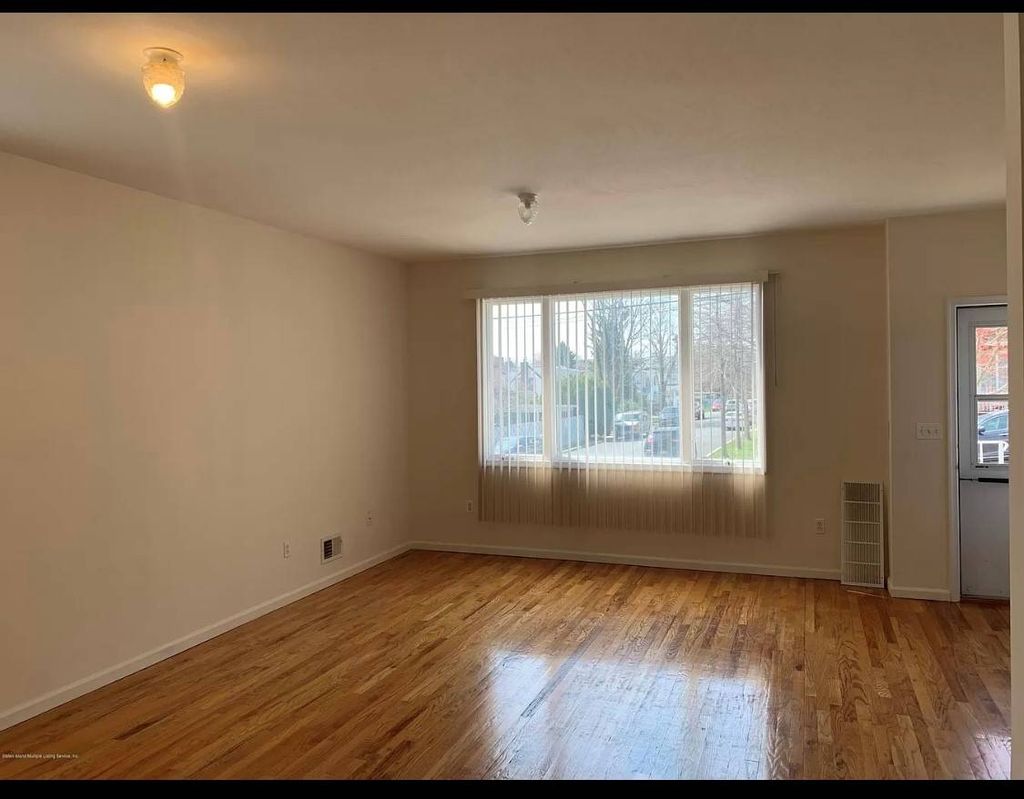 Photo of 15 Hunter Ave #1, Staten Island, NY 10306 (MLS # 11655380)