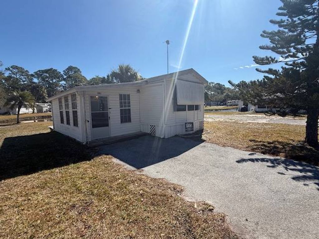 Photo of 10521 Scenic Drive Lot 381 Dr, Port Richey, FL 34668 (MLS # 11652219)