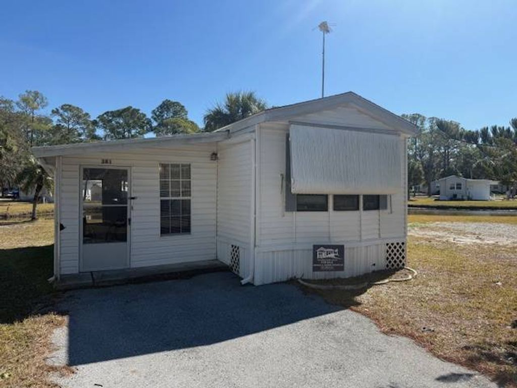 Photo of 10521 Scenic Drive Lot 381 Dr, Port Richey, FL 34668 (MLS # 11652219)