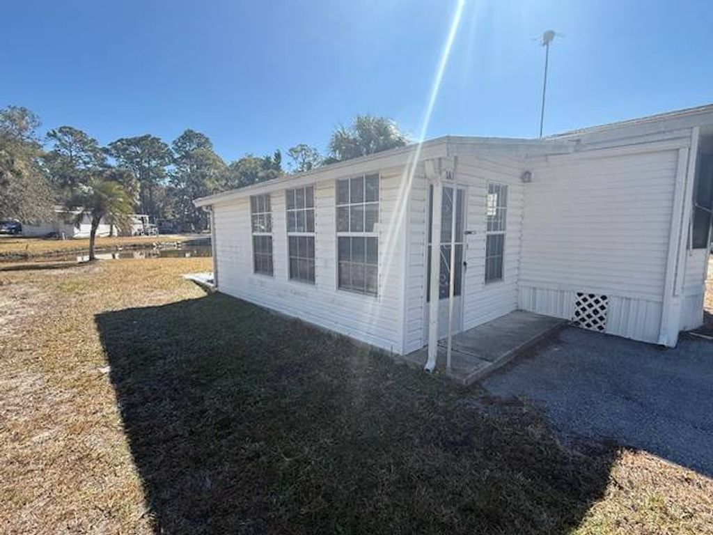 Photo of 10521 Scenic Drive Lot 381 Dr, Port Richey, FL 34668 (MLS # 11652219)