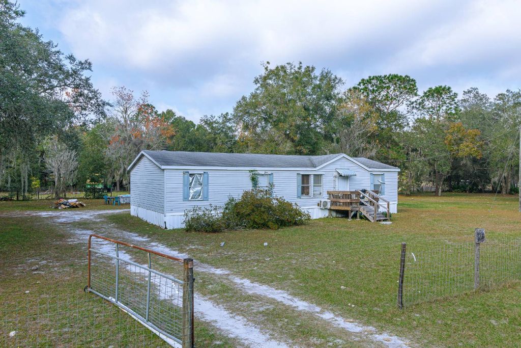 Photo of 15840 100th Ave, Dunnellon, FL 34432 (MLS # 11623228)