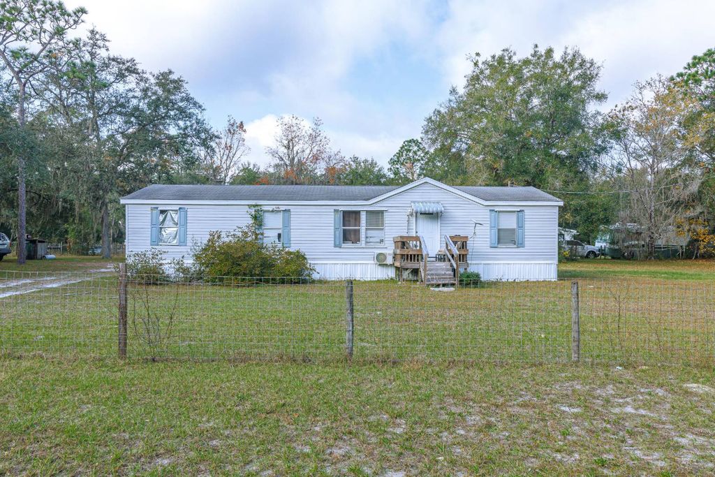 Photo of 15840 100th Ave, Dunnellon, FL 34432 (MLS # 11623228)