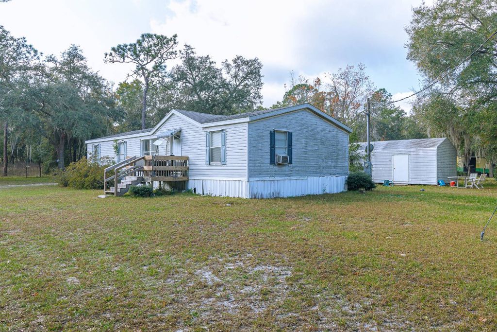Photo of 15840 100th Ave, Dunnellon, FL 34432 (MLS # 11623228)