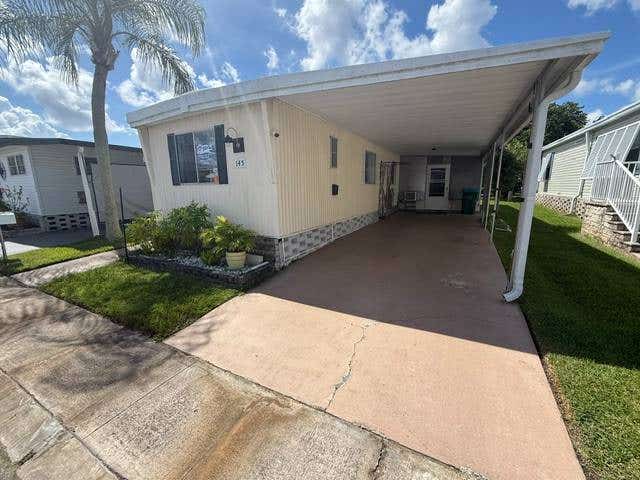 Photo of 3113 State Road 580 Lot 145, Safety Harbor, FL 34695 (MLS # 11931294)