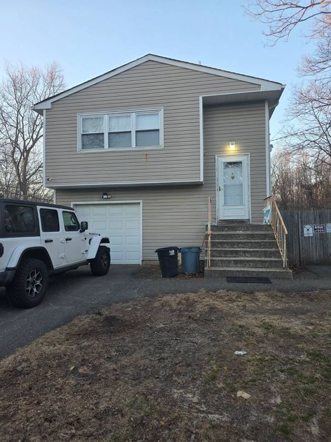 Photo of 717 Expressway Dr North Dr, Medford, NY 11763 (MLS # 11685429)