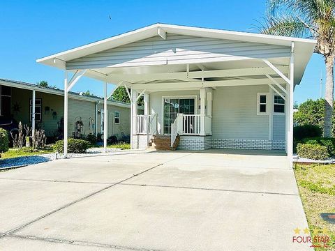Photo of 29211 Cutter Ln, Leesburg, FL 34748 (MLS # 11737381)