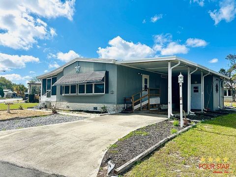 Photo of 22 el Presidente Blvd, Leesburg, FL 34748 (MLS # 11669316)