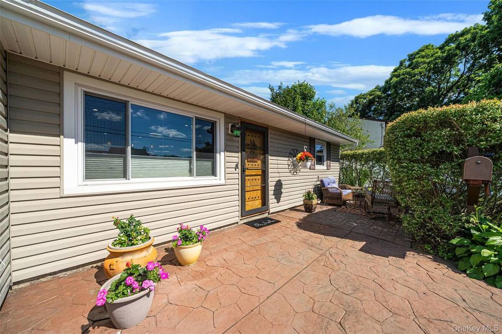 Photo of 1053 Ocean Avenue, Bay Shore, NY 11706 (MLS # 11855301)
