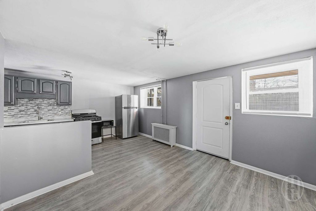 Photo of 1318 East 58th Street #TOWNHOUSE, Brooklyn, NY 11234 (MLS # 11651045)