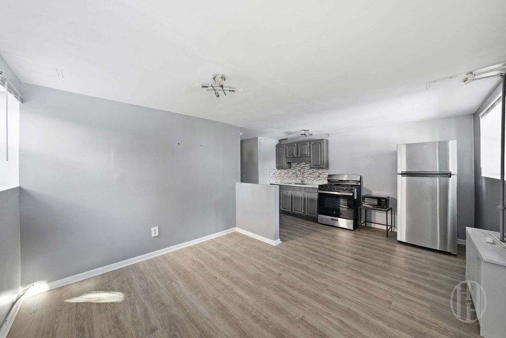 Photo of 1318 East 58th Street #TOWNHOUSE, Brooklyn, NY 11234 (MLS # 11651045)