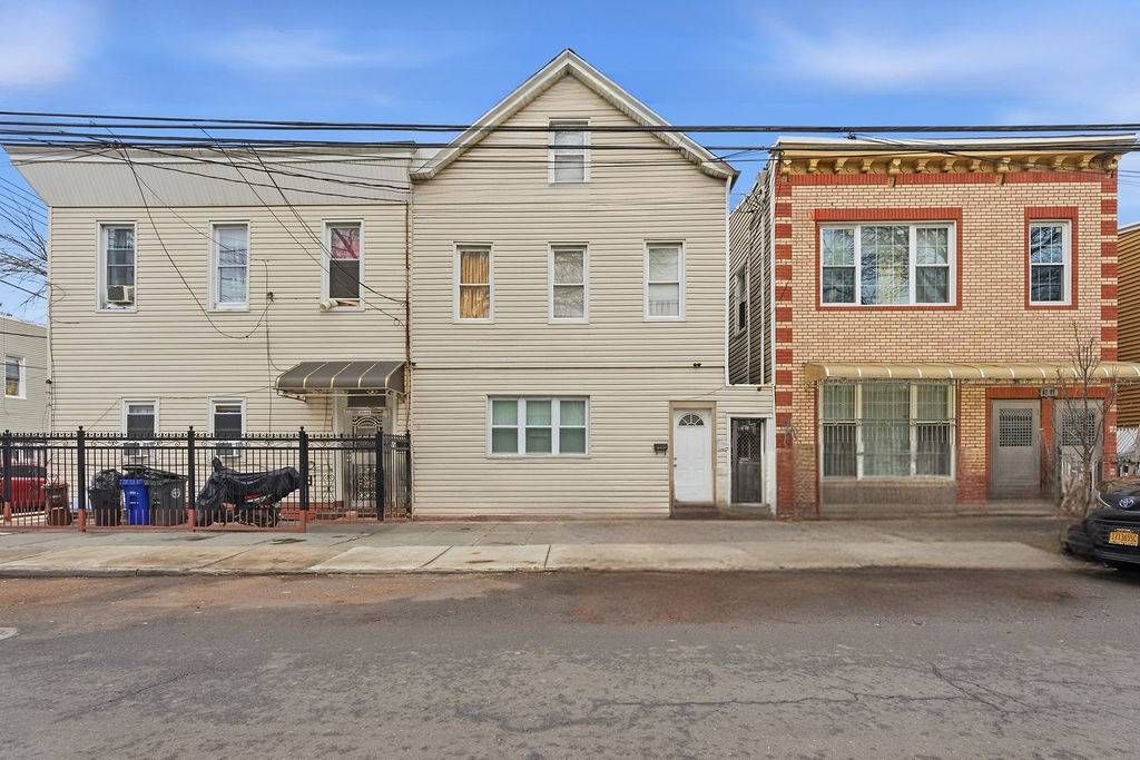 Photo of 8703 95th Avenue, Ozone Park, NY 11416 (MLS # 11635975)